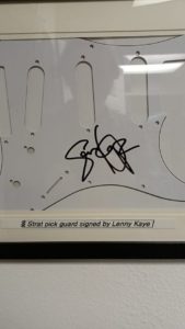 pick guard signed by Lenny Kay